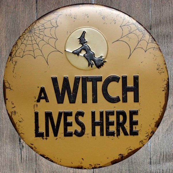 A Witch Lives Here Round Embossed Metal Tin Sign Poster