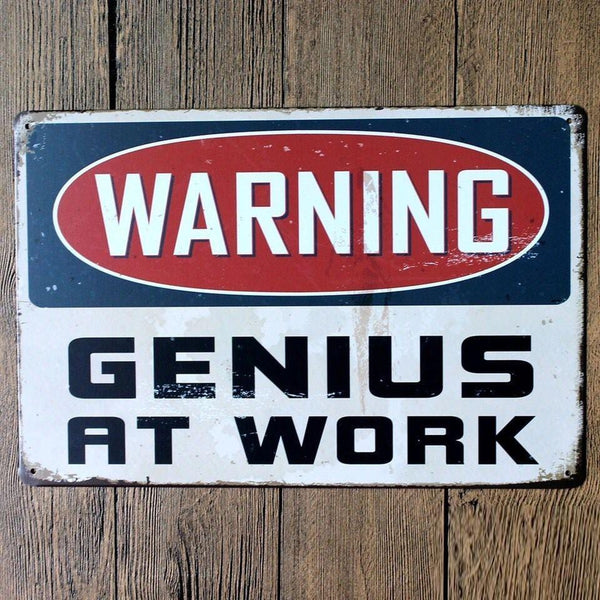 Genius at Work Sign - Metal Tin Poster